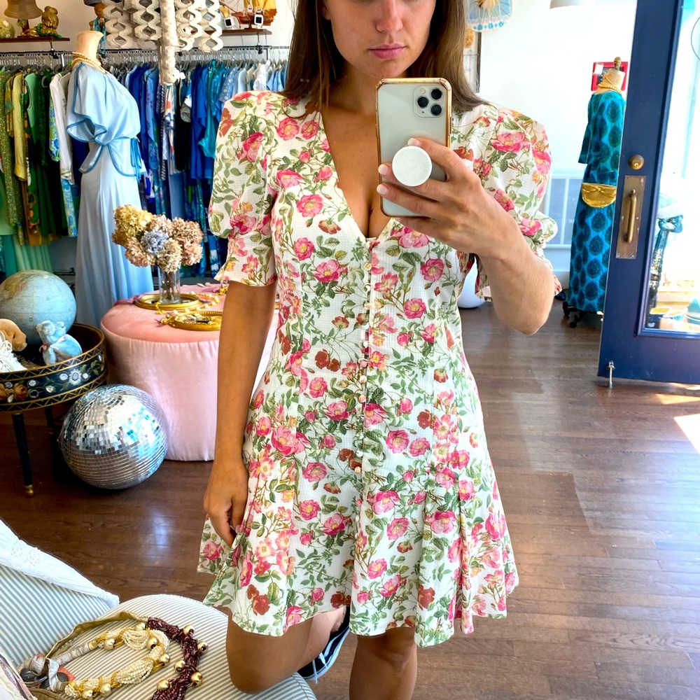 Camellia floral printed lightweight cotton mini dress with V neckline.